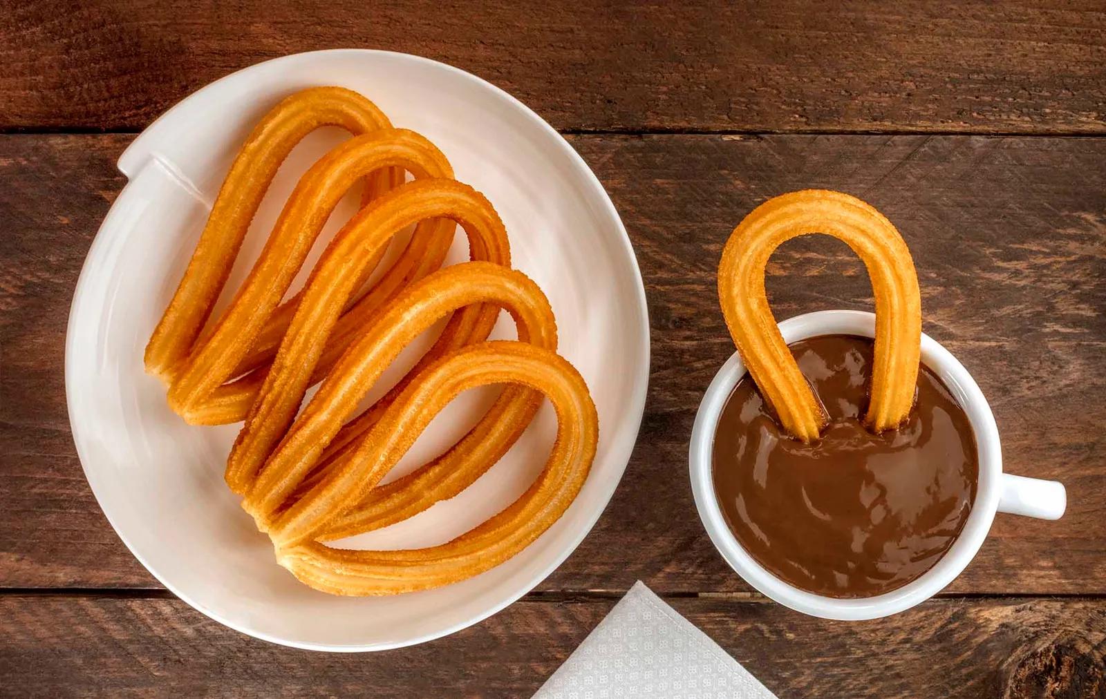 <b>Mejor Chocolate con Churros en Madrid</b>: Guía Completa de las Churrerías más Famosas - Dónde se pueden conseguir los mejores churros de España mejor chocolate con churros madrid - Dónde se pueden conseguir los mejores churros de España