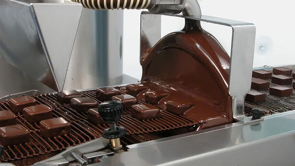 chocolate enrober - Qué significa el envoltorio en una fábrica de chocolate