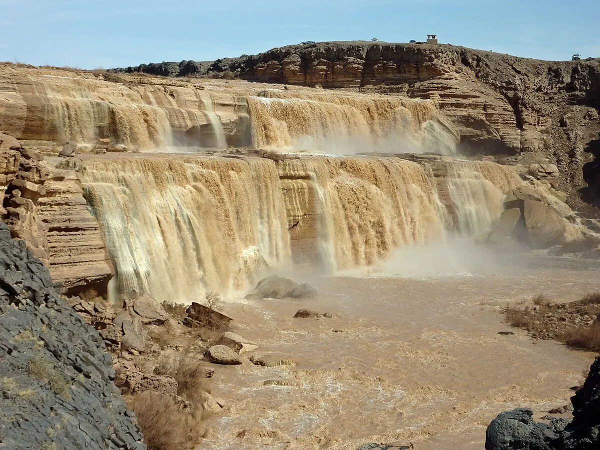 willy wonka chocolate waterfall - Where is the chocolate waterfall located